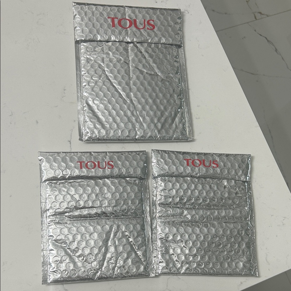 Tous jewelry pouch